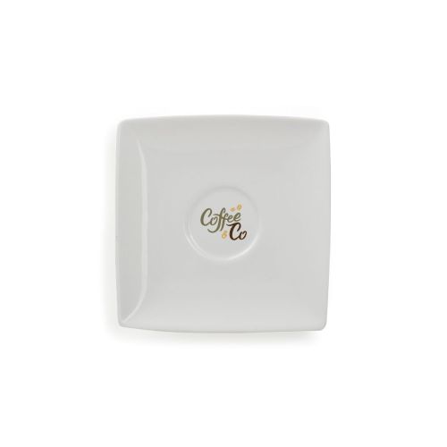 Squito espresso schotel 10 cm van porselein met meerkleurig CoffeeCo logo op de bovenzijde.