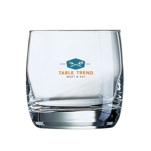 Glazen Vigne tumbler van 31 cl. met meerkleurenlogo van TableTrend op voorzijde, centraal gepositioneerd. Glazen Vigne tumbler van 31 cl. met meerkleurenlogo van TableTrend op voorzijde, centraal gepositioneerd.