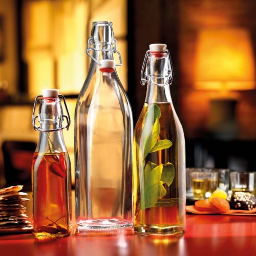 0.5-litre glass swing-top bottle, filled and photographed in a realistic ambient environment. 0.5-litre glass swing-top bottle, filled and photographed in a realistic ambient environment.