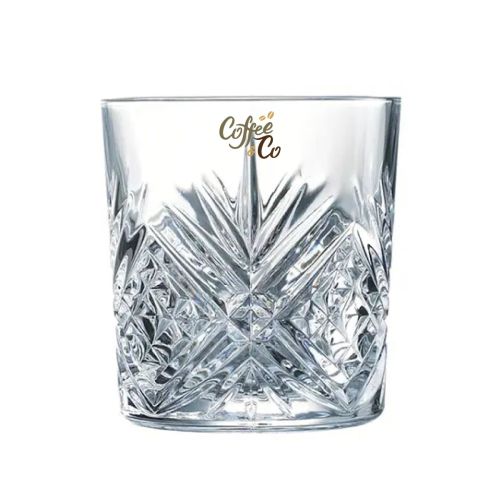 Front of Broadway Tumbler 30 cl. glass with multicoloured CoffeeCo logo on transparent glass.