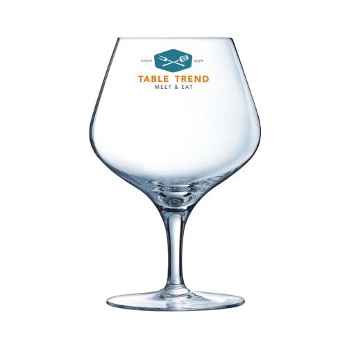 Sublym Cognac glass 35 cl. printed with multi-coloured TableTrend logo on the front face of the glass.
