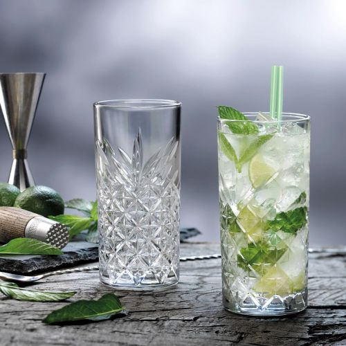 Timeless Longdrink glass 45 cl. with filling, placed in an atmospheric setting. Timeless Longdrink glass 45 cl. with filling, placed in an atmospheric setting.