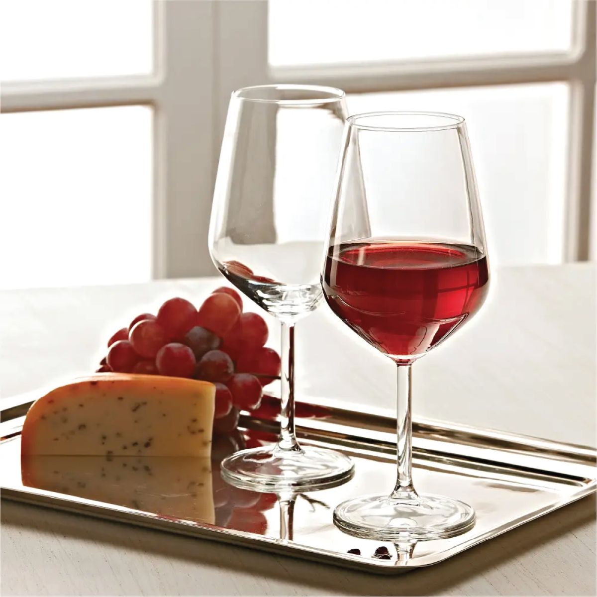 Allegra wine glass 35 cl. glass placed in a neutral space on tray.