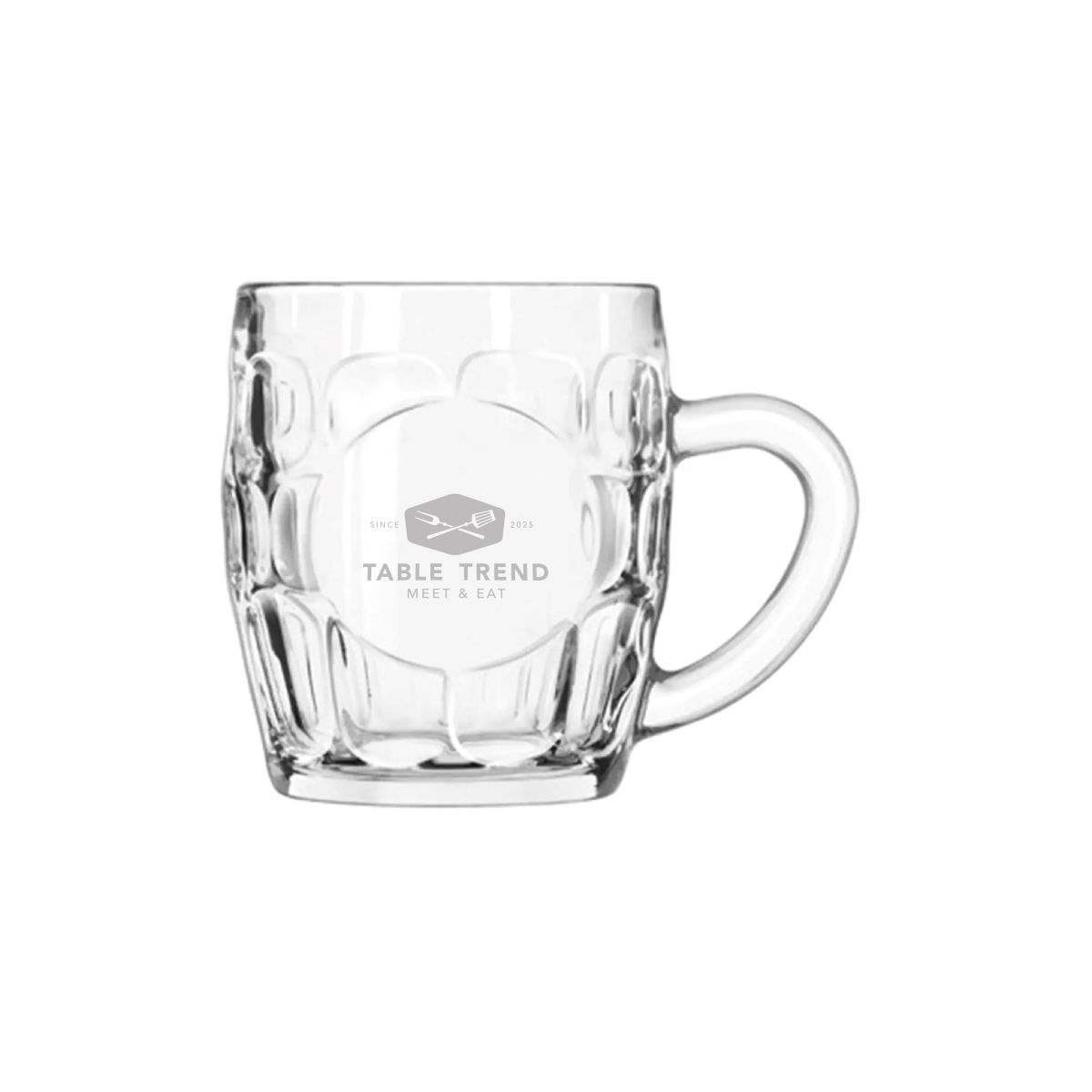 Engraving of TableTrend logo on front of beer mug October 29 cl, subtly in glass.