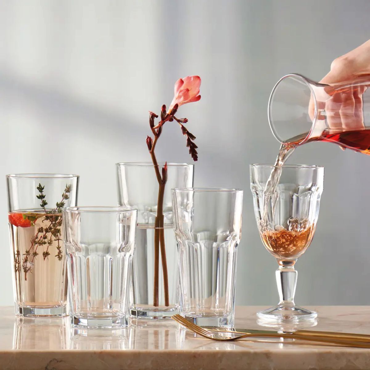 Casablanca Latte High glass 28.5 cl. in use situation with drink, captured in action image.