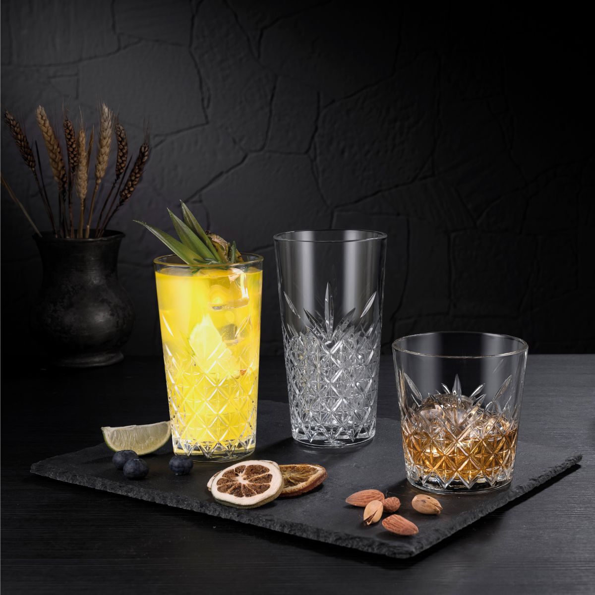Glass filled with liquor, attractively presented in interior setting.